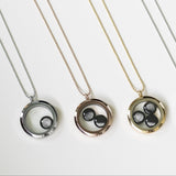 one moon locket in stainless steel