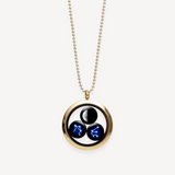 moon and stars family locket in gold