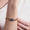 astral lunar curb link bracelet in gold