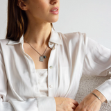 the oracle zodiac card necklace in gold