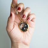 lovers in the locket necklace in gold