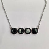 four moon lunar horizon in stainless steel