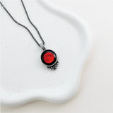 red moon classic necklace pendant front view with black crystal accent