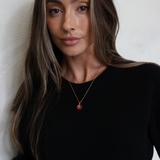 model wearing red moon mini gold simplicity necklace on chain