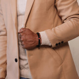 red moon titan bracelet on wrist with minimal styling, close-up