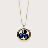 moon and stars family locket in gold