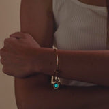 logosphere birthstone bangle in gold